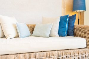 Pillow on sofa with light lamp decoration interior of living room area